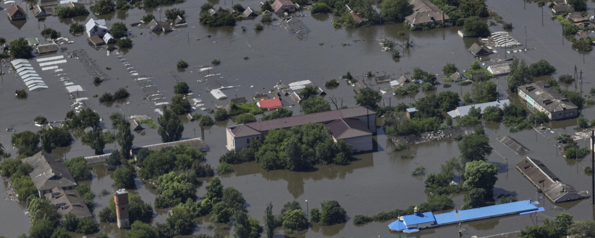 Houses are seen underwater in the flooded village of Dnipryany after the collapse of Kakhovka Dam Wednesday, June 7, 2023.  - Sputnik Africa, 1920, 08.06.2023