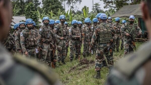 MONUSCO blue helmet deployed near Kibumba, north of Goma, Democratic Republic of Congo, Friday Jan. 28, 2022. Thousands of people in the Democratic Republic of Congo have been displaced after they fled ongoing clashes between the Congolese army and M23 fighters this week.  - Sputnik Afrique
