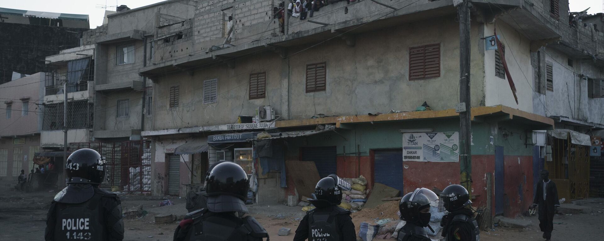 Police in riot gear stand guard during clashes with demonstrators in Dakar, Senegal, Saturday, June 3, 2023. The clashes first broke out, later this week, after opposition leader Ousmane Sonko was convicted of corrupting youth and sentenced to two years in prison. - Sputnik Africa, 1920, 08.06.2023