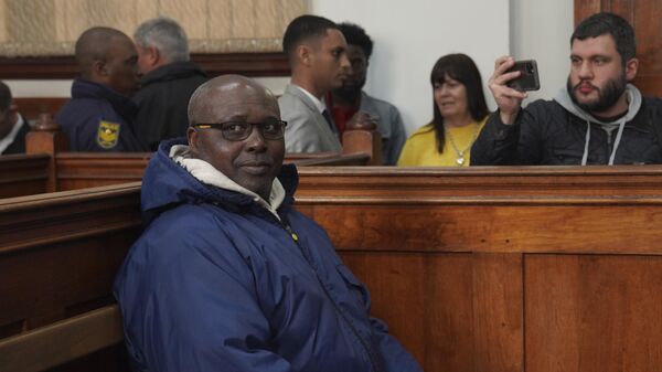 Fulgence Kayishema sits in the Magistrate's Court in Cape Town, South Africa, Friday, May 26, 2023. Kayishema, a former police officer, is one of the most wanted suspects in Rwanda's genocide and is suspected of orchestrating the killing of some 2,000 people nearly three decades ago.  - Sputnik Africa