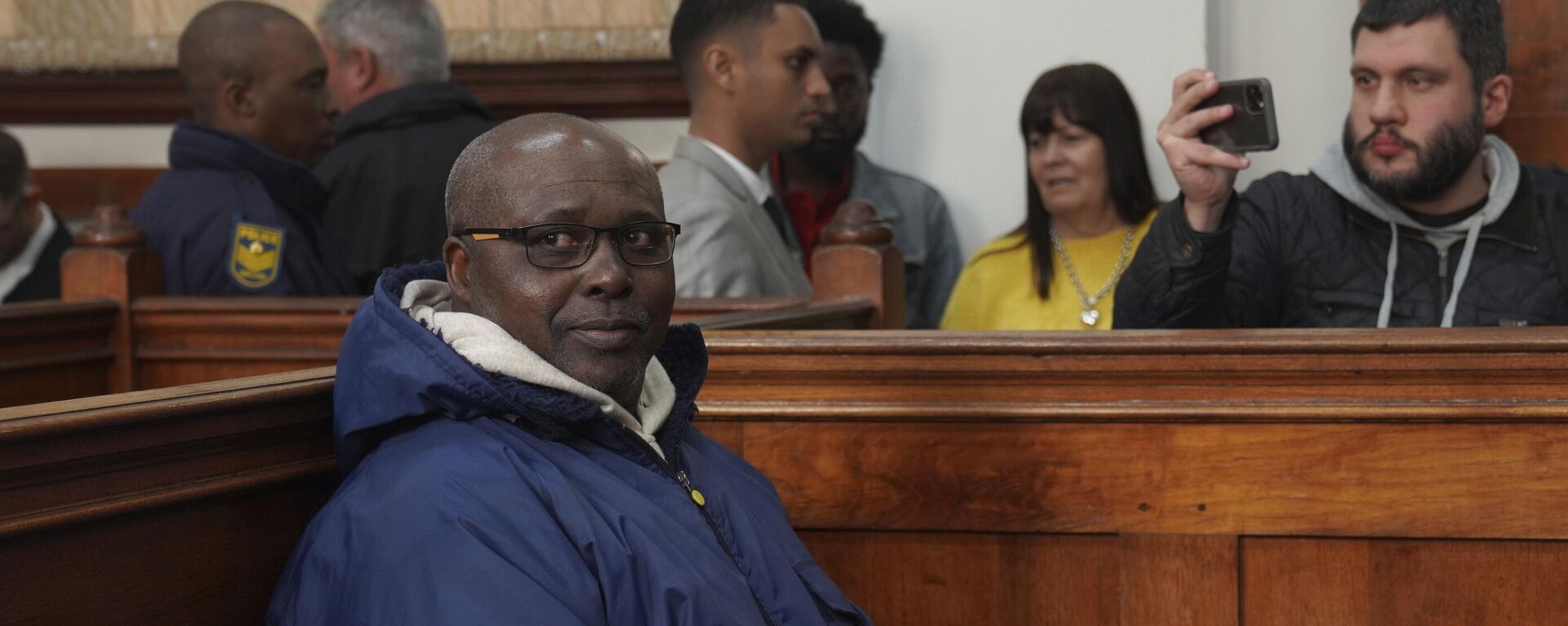 Fulgence Kayishema sits in the Magistrate's Court in Cape Town, South Africa, Friday, May 26, 2023. Kayishema, a former police officer, is one of the most wanted suspects in Rwanda's genocide and is suspected of orchestrating the killing of some 2,000 people nearly three decades ago.  - Sputnik Africa, 1920, 09.06.2023
