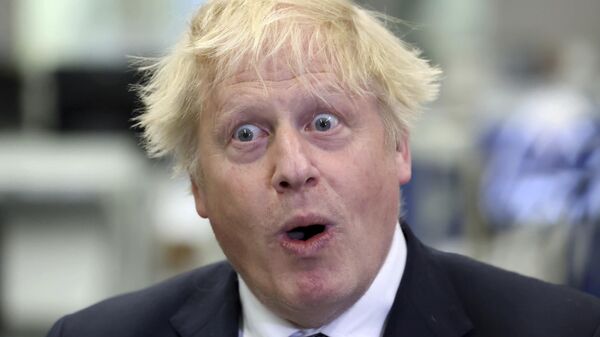 British Prime Minister Boris Johnson at Thales weapons manufacturer in Belfast, Monday May 16, 2022 - Sputnik Africa