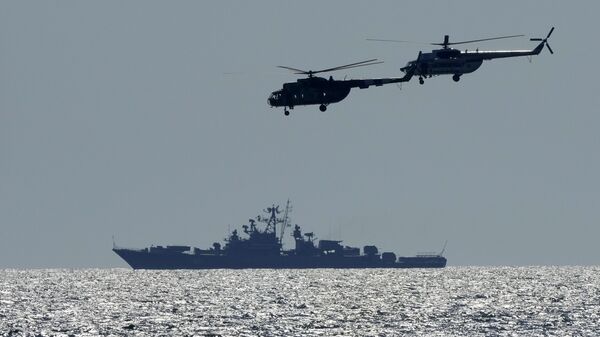 Ukrainian helicopters fly over a Russian warship  during Sea Breeze 2021 maneuvers, in the Black Sea, Friday, July 9, 2021 - Sputnik Africa
