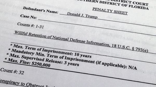 The indictment against former President Donald Trump is photographed on Friday, June 9, 2023. Trump is facing 37 felony charges related to the mishandling of classified documents according to the unsealed indictment that also alleges that he improperly shared a Pentagon plan of attack and a classified map related to a military operation. - Sputnik Africa