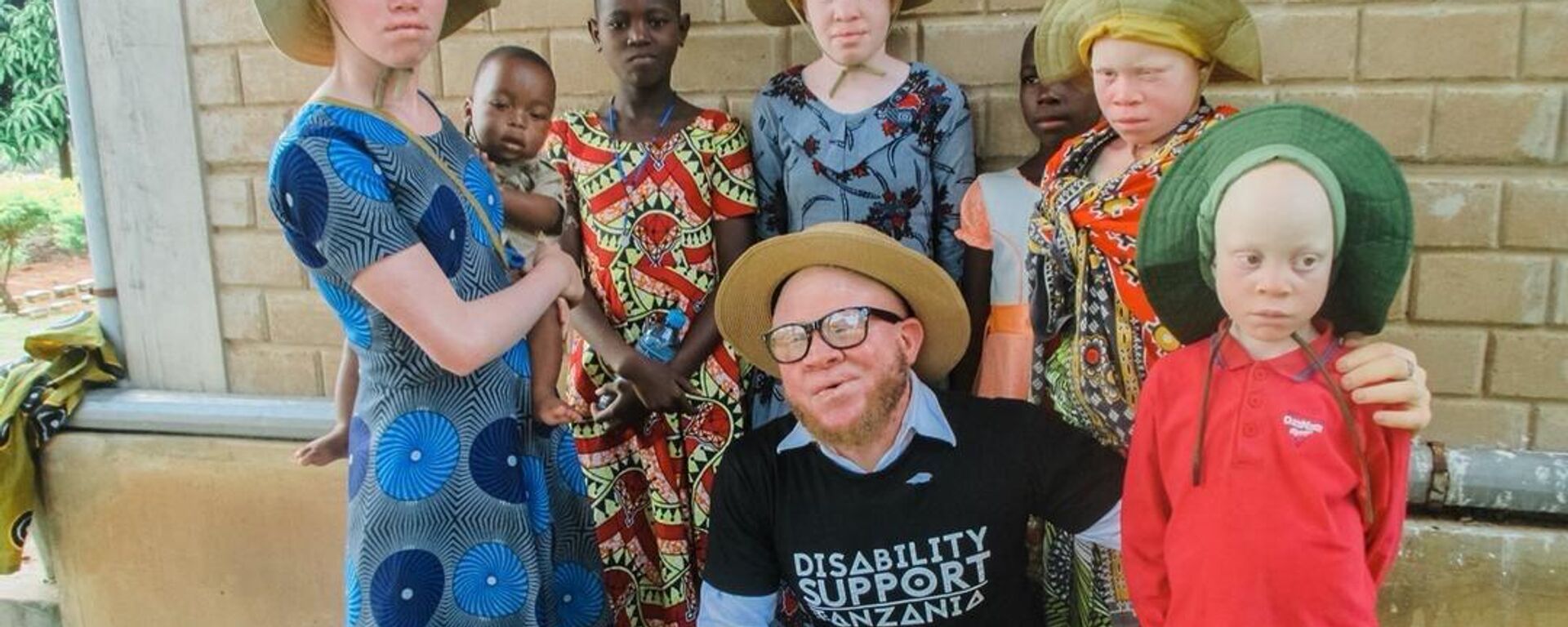 This photo was taken on January 1, 2022, in Ukerewe, where Sixmond Mdeka, a Tanzanian gospel reggae singer, preacher, and social advocate for disability and albinism awareness, organized a Christmas and New Year's party for marginalized groups, including people with albinism, the physically disabled, and the elderly, through his organization Disability Support Tanzania. - Sputnik Africa, 1920, 13.06.2023
