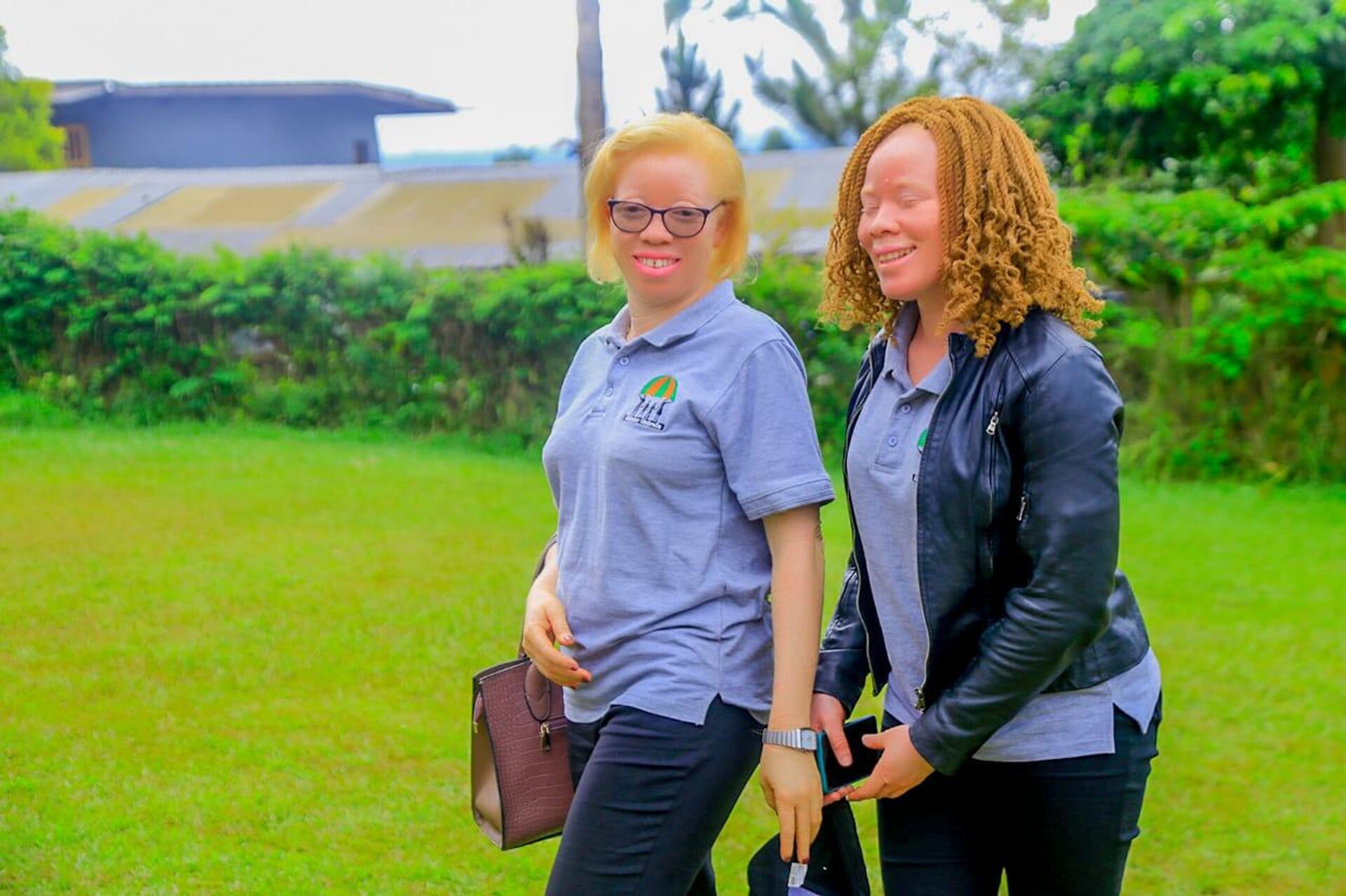 Olive Namutebi, co-founder of the non-governmental organization Albinism Umbrella in Uganda, in Phiona during a school awareness session. - Sputnik Africa, 1920, 13.06.2023