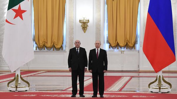 Russian President Vladimir Putin and Algerian President Abdelmajid Tebboune (left) during a meeting in the Kremlin. - Sputnik Afrique