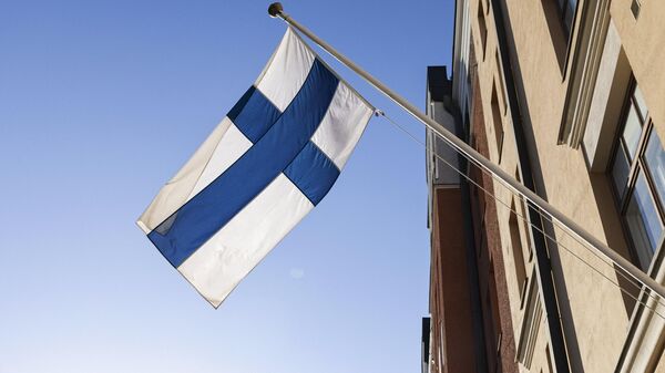 Finnish flag flutters during the parliamentary election day in Helsinki on April 2, 2023 - Sputnik Africa