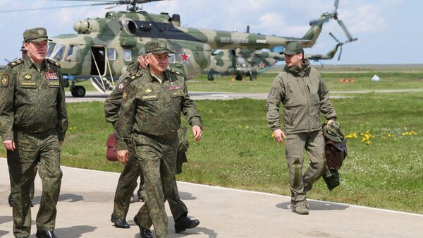 Russian Defence Minister Sergei Shoigu during military drills in Crimea, 22 April 2021 - Sputnik Africa