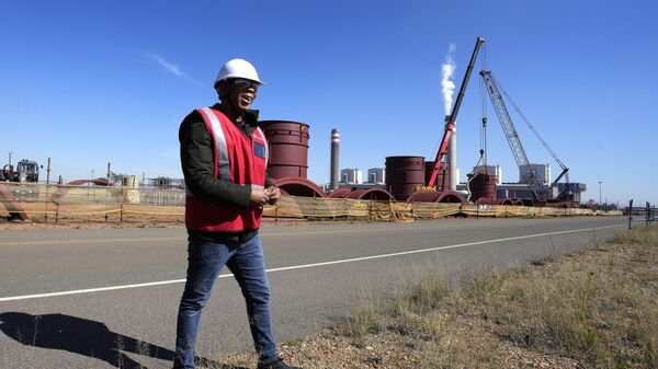 South Africa's Minister in the Presidency responsible for Electricity, Kgosientsho Ramokgopa, looks on during his visit to the Kusile coal-fired power plant near Emalahleni, South Africa, Monday, May 22, 2023, to assess progress made the ongoing construction project currently taking place at the power station. - Sputnik Africa
