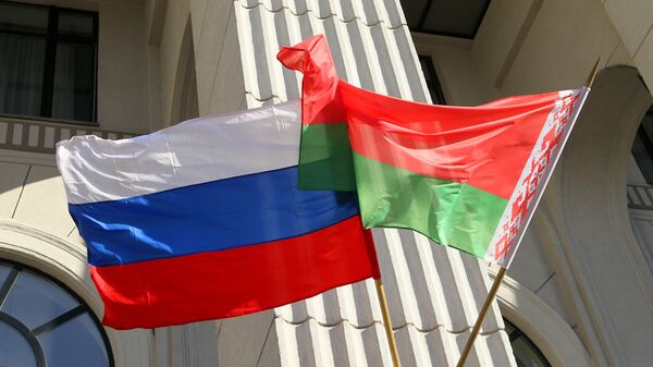 State colors of Russia and Belarus on the building of the Minsk Philharmonic. - Sputnik Africa