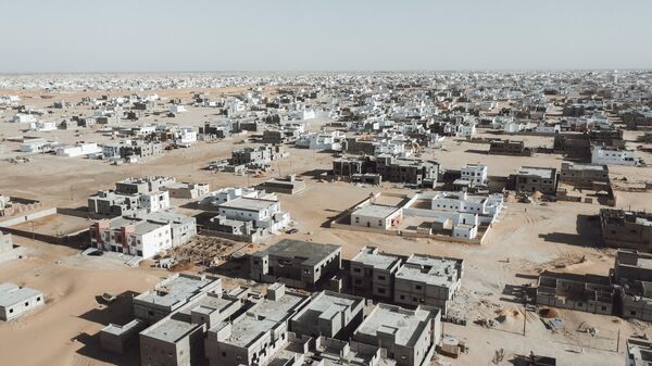 This aerial view shows new buildings in the desert-bordering area of Saharawi in Nouakchott, on March 11, 2023 - Sputnik Africa