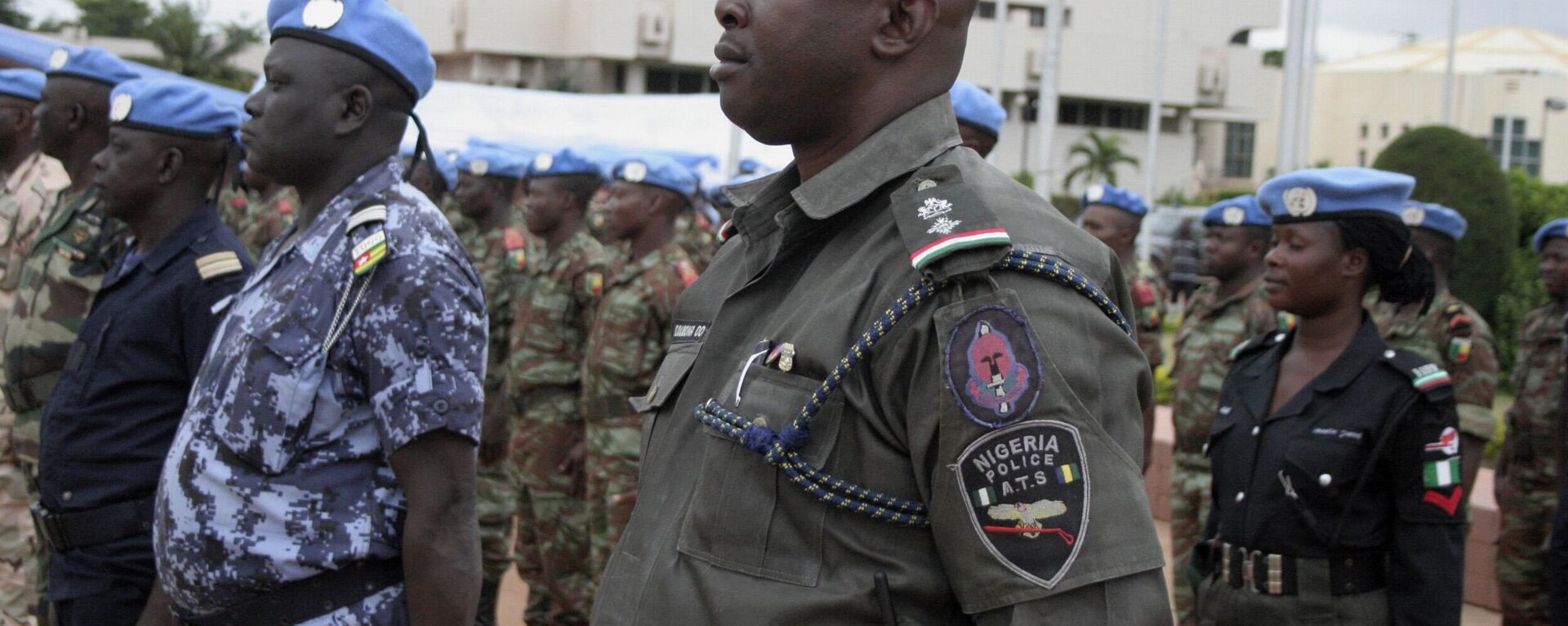 African soldiers and police who helped France take back control of Mali's north earlier this year participate in a ceremony formally transforming the force into a United Nations peacekeeping mission, in Bamako, Mali, Monday, July 1, 2013. T - Sputnik Africa, 1920, 27.06.2023