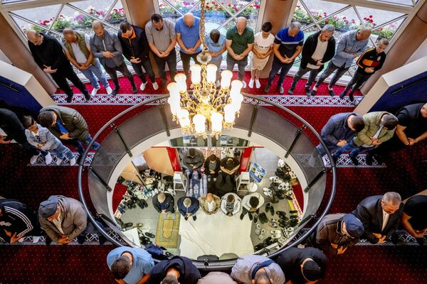 Dutch Muslims pray as they attend an early morning prayer on Eid Al-Adha or Feast of Sacrifice, at the Mevlana Mosque in Rotterdam. - Sputnik Africa