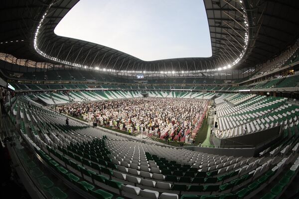 Muslim worshippers gather for the Eid al-Adha morning prayer at Doha&#x27;s Education City Stadium, which hosted matches during Qatar&#x27;s 2022 FIFA World Cup, on the first day of the Muslim holiday. - Sputnik Africa