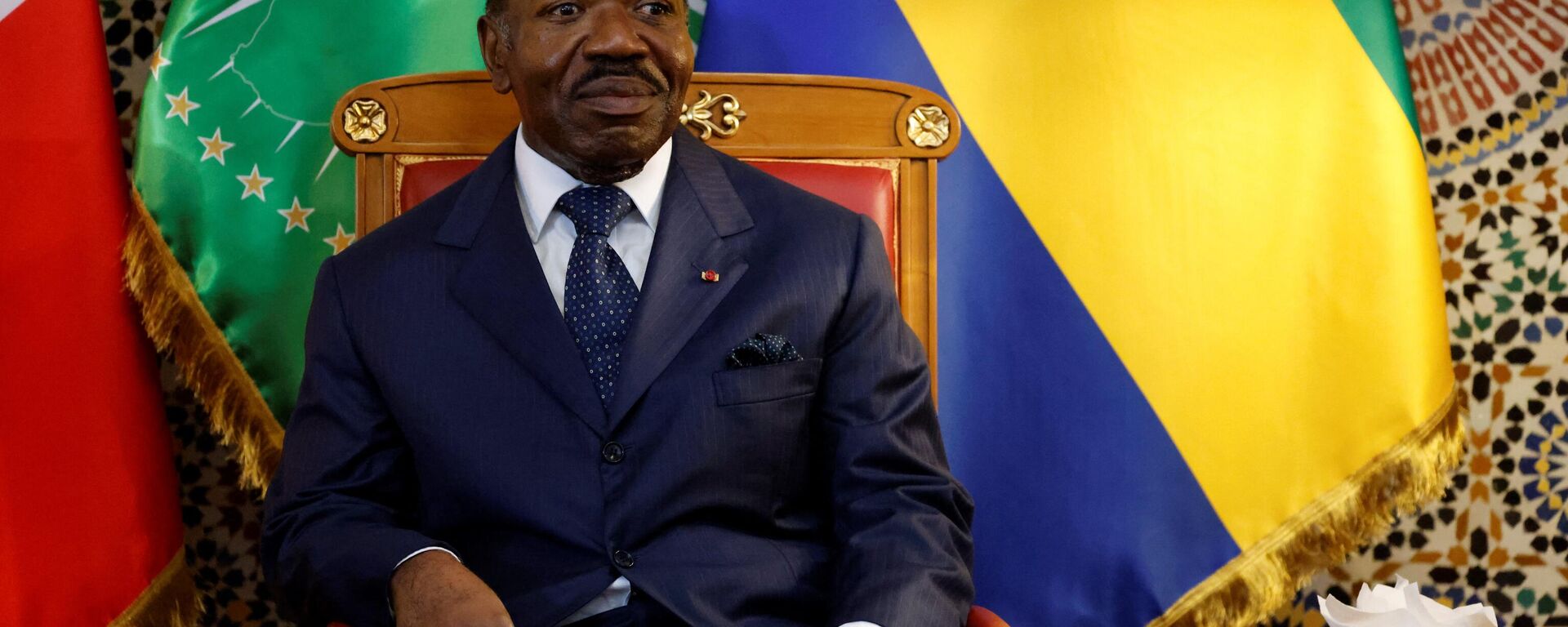 Gabon's President Ali Bongo Ondimba listens to French President Emmanuel Macron (not seen) during a bilateral meeting at Presidential Palace in Libreville, on March 1, 2023.  - Sputnik Africa, 1920, 10.07.2023