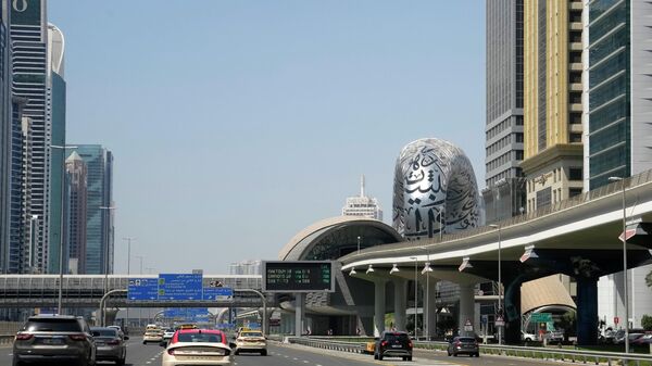 Cars pass by a metro station on Sheikh Zayed Highway in Dubai United Arab Emirates, Saturday, July 1, 2023. - Sputnik Africa