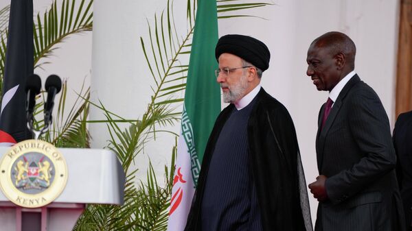 Iran's President Ebrahim Raisi, center, and Kenya's President William Ruto, right, arrive to give a joint press conference after meeting at State House in Nairobi, Kenya Wednesday, July 12, 2023. - Sputnik Africa