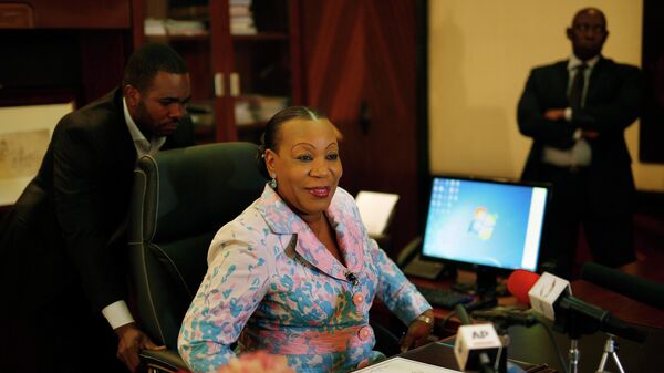 Interim Central African President Catherine Samba-Panza gets ready to tape a televised address to the nation scheduled to air Saturday Feb. 13, 2016, at the Presidency in   Bangui, Central African Republic,  Friday Feb. 12, 2016. - Sputnik Africa