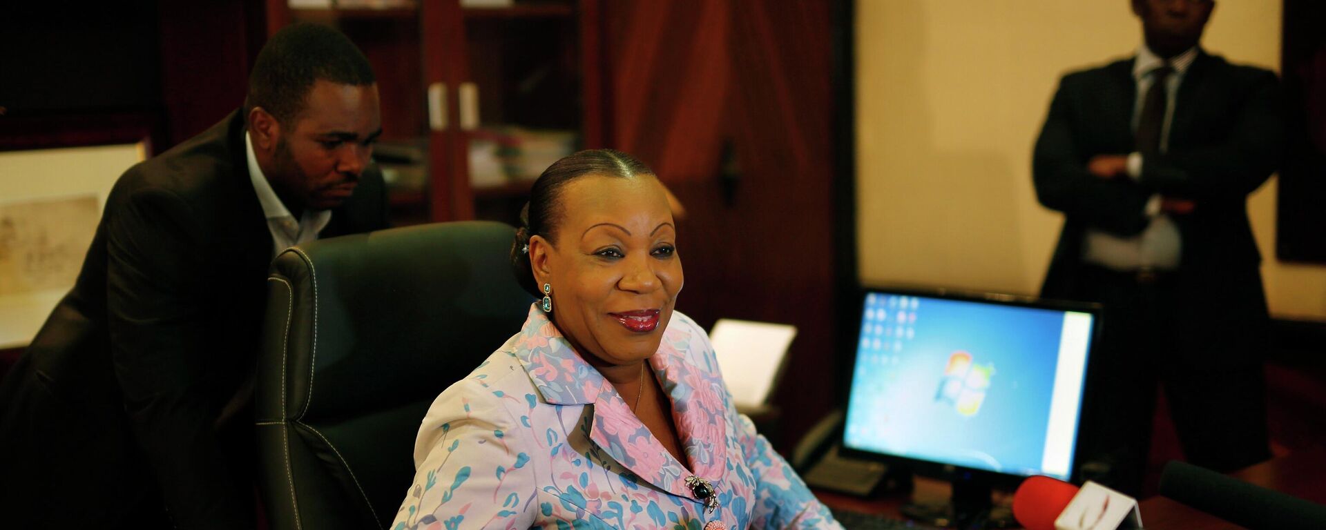 Interim Central African President Catherine Samba-Panza gets ready to tape a televised address to the nation scheduled to air Saturday Feb. 13, 2016, at the Presidency in   Bangui, Central African Republic,  Friday Feb. 12, 2016. - Sputnik Africa, 1920, 12.07.2023