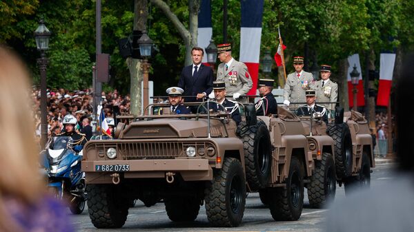Emmanuel Macron au défilé du 14 juillet 2023 à Paris - Sputnik Afrique
