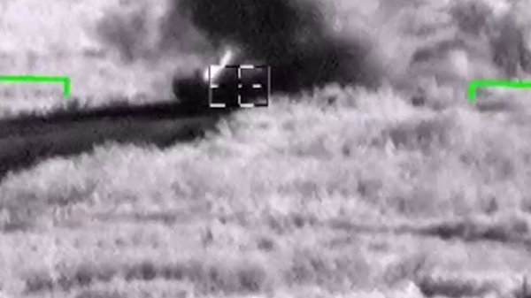Video footage from Russia's defense ministry shows an attack on a Ukrainian armored vehicle in the Donbass. - Sputnik Africa