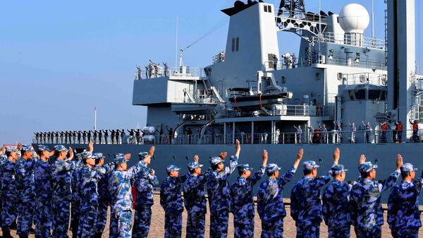 Soldiers of the Chinese People's Liberation Army (PLA) Navy take part in a ceremony as a replenishment ship sets sail to the Gulf of Aden and the waters off Somalia, from a naval port in Qingdao, Shandong province, China September 3, 2020 - Sputnik Africa
