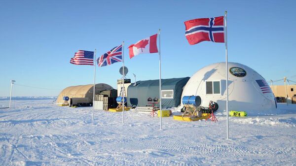 This 2016 photo provided by the US Navy shows a base camp for submarine sea ice exercises in the Beaufort Sea off Alaska's north coast.  - Sputnik Africa