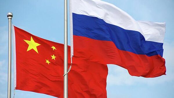 The flags of Russia and China - Sputnik Africa