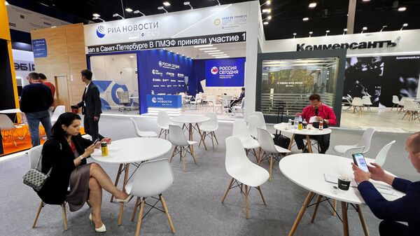 Stands of the Russian media outlets RIA Novosti and Kommersant at the SPIEF-2023. - Sputnik Africa