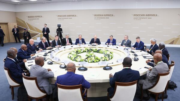 Russian President Vladimir Putin, Chairman of the African Union, President of the Union of the Comoros Azali Assoumani and Chairman of the African Union Commission Moussa Faki Mahamat during a meeting on the sidelines of the second Russia-Africa Summit in St. Petersburg on July 27, 2023. - Sputnik Africa