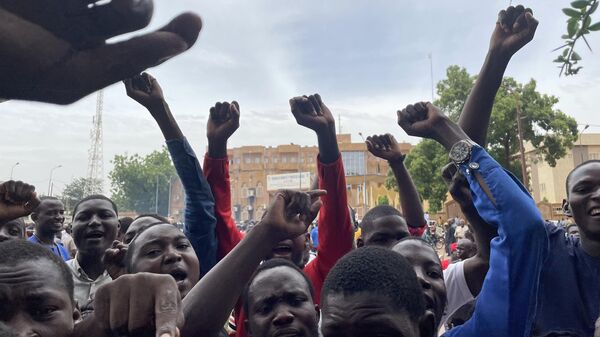 Supporters of the Nigerien defence and security forces gather during a demonstration outside the national assembly in Niamey on July 27, 2023 - Sputnik Africa