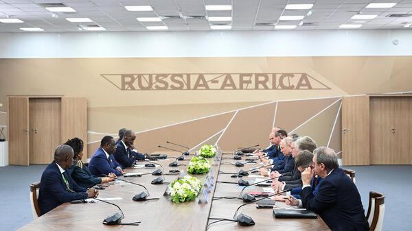 Réunion de Vladimir Poutine et Macky Sall en marge du sommet Russie-Afrique - Sputnik Afrique