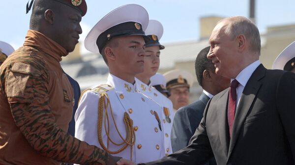 President of the Russian Federation, Supreme Commander-in-Chief Vladimir Putin and President of the Transitional Period of the Republic of Burkina Faso Ibrahim Traore (left) at the Main Naval Parade on the occasion of the Russian Navy Day, July 30, 2023 - Sputnik Africa