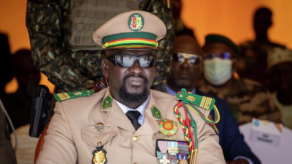 Guinea's junta leader Col. Mamady Doumbouya watches over an independence day military parade in Bamako, Mali Thursday, Sept. 22, 2022.  - Sputnik Africa