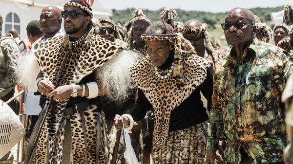 King of the Zulu nation, Misuzulu Zulu (L), traditional Prime Minister of the Zulu nation Prince Mangosuthu Buthelezi (C) and former South African President Jacob Zuma (R) attend  the reenactment of the Battle of Isandlwana, in Isandlwana on January 21, 2023. - Sputnik Africa
