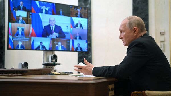 Russian President Vladimir Putin holds a meeting via videoconference with members of the country's government on August 2, 2023.  - Sputnik Africa