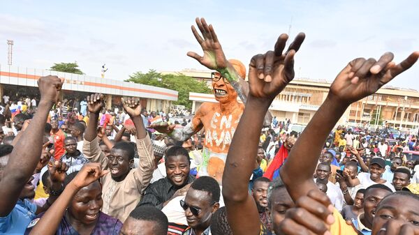 Supporters of Niger's National Council for the Safeguard of the Homeland (CNSP) demonstrate in Niamey on August 6, 2023.  - Sputnik Africa