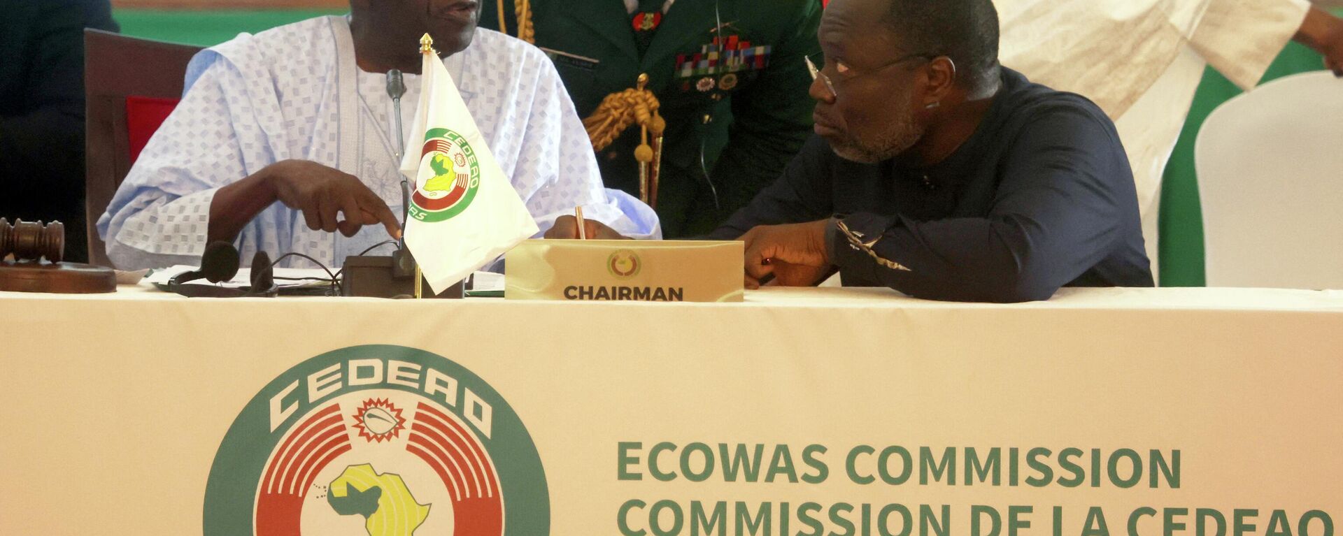 Chairperson of Economic Community of West African States (ECOWAS) and President of Nigeria, Bola Ahmed Tinubu (L) interacts with President of ECOWAS Commission Omar Touray (R), during the ECOWAS Head of States and Government extraordinary session in Abuja, on August 10, 2023.  - Sputnik Africa, 1920, 17.08.2023