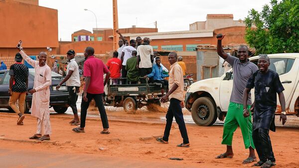 Nigerien men gather for an anti-French protest in Niamey, Niger, Friday, Aug. 11, 2023. - Sputnik Africa