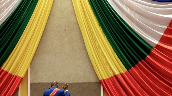 Central African Republic President Faustin-Archange Touadera raises his hand - Sputnik Africa