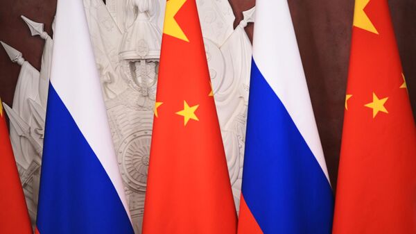 March 21, 2023. Flags in the Malachite Hall of the Grand Kremlin Palace, where the signing ceremony of joint documents on deepening relations and areas of cooperation until 2030 between Russia and China will take place. - Sputnik Africa