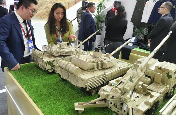 Models of military equipment and weapons at the stand of the Ministry of Defense of China. - Sputnik Africa