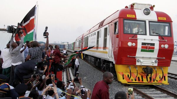 In this May 30, 2017, file photo, the SGR cargo train rides from the port containers depot on a Chinese-backed railway costing nearly $3.3 billion, opened by Kenya's president as one of the country's largest infrastructure project since independence, in Mombasa, Kenya. - Sputnik Africa