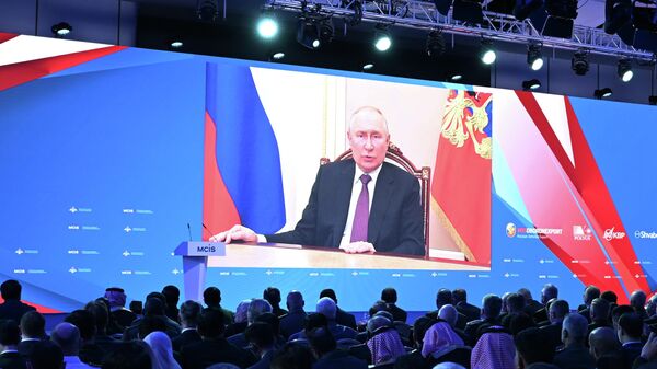 Russian President Vladimir Putin appears on a screen during a video address to the participants the 11th Moscow Conference on International Security (MCIS) at Patriot Congress and Exhibition Centre in Moscow region, Russia, on August 15, 2023. - Sputnik Africa