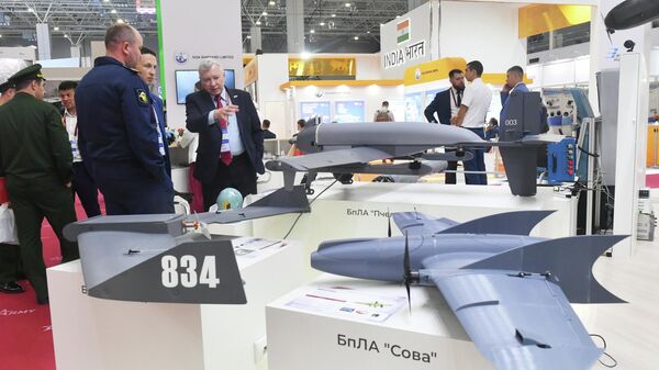 Russian multifunctional unmanned aerial vehicle Owl (right) at the exhibition within the framework of the International Military-Technical Forum ARMY-2023 at the Patriot Convention and Exhibition Center - Sputnik Africa