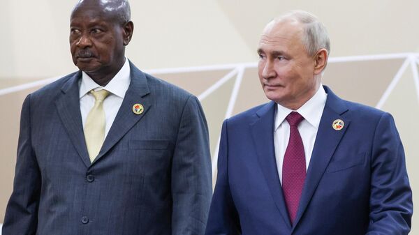 Russian President Vladimir Putin and Ugandan President Yoweri Kaguta Museveni during a meeting on the sidelines of the second Russia-Africa Summit and Forum in St. Petersburg, July 27, 2023 - Sputnik Africa