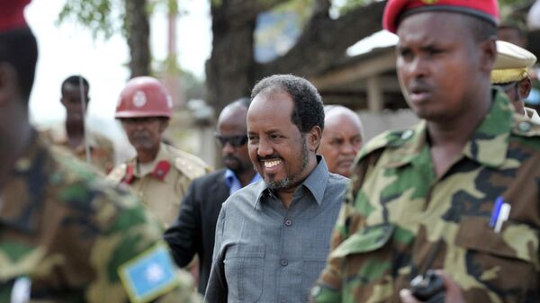 Somali President Hassan Sheikh Mohamud arrives at the 54th Anniversary of the Somali National Army held at the Army Headquarters in Mogadishu, on April 12, 2014. - Sputnik Africa