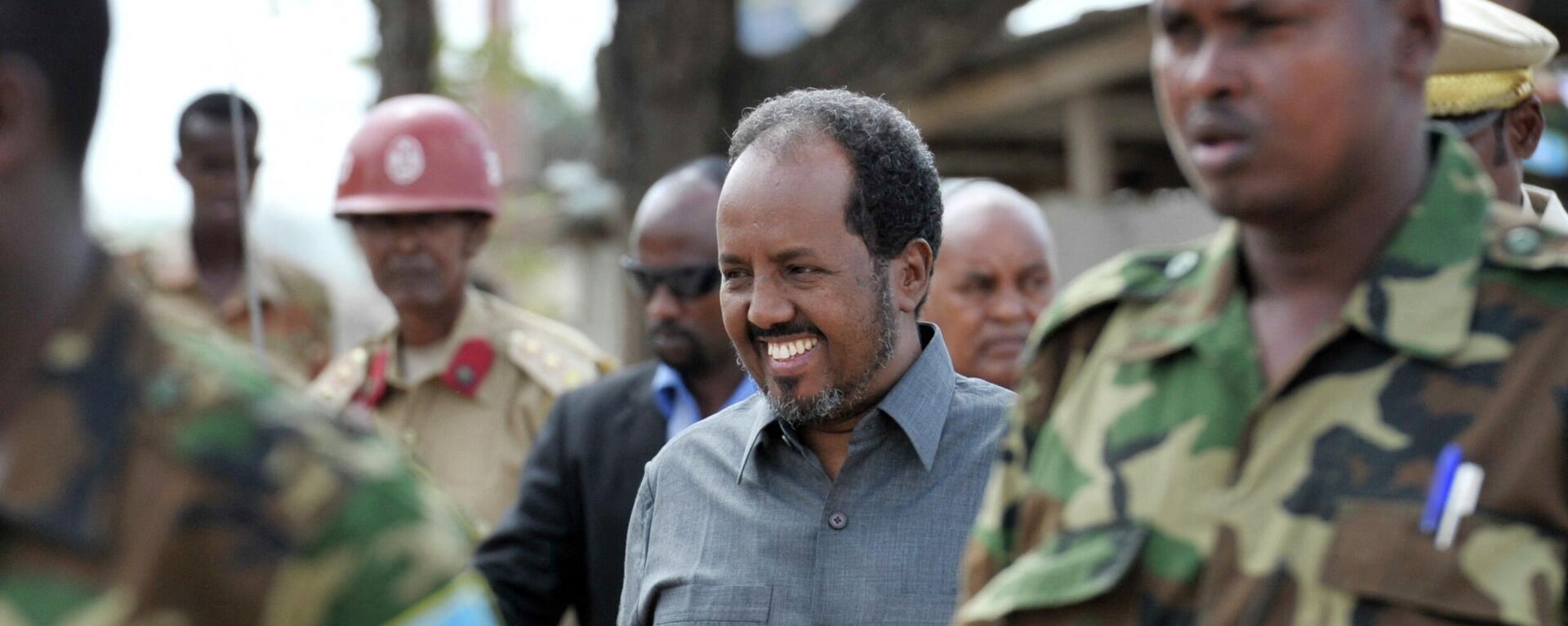 Somali President Hassan Sheikh Mohamud arrives at the 54th Anniversary of the Somali National Army held at the Army Headquarters in Mogadishu, on April 12, 2014. - Sputnik Africa, 1920, 17.08.2023