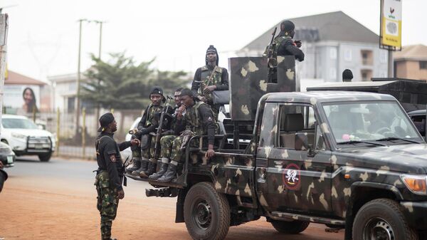 Military forces arrive to secure the presidential elections, in Anambra, Nigeria, Friday, Feb. 24, 2023. - Sputnik Africa